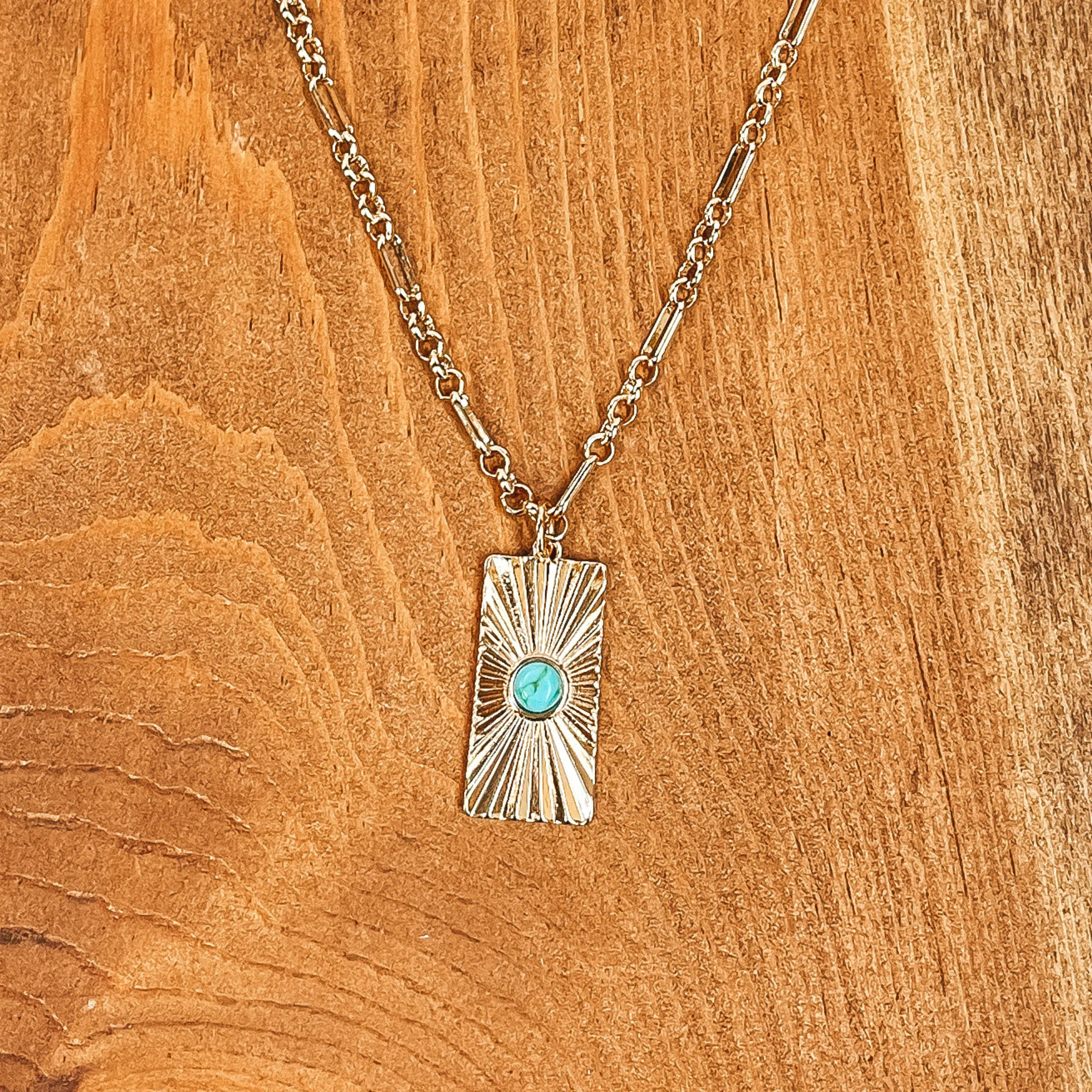 Convince Me Gold Necklace with Sunburst Rectangle Pendant and Small Stone in Turquoise