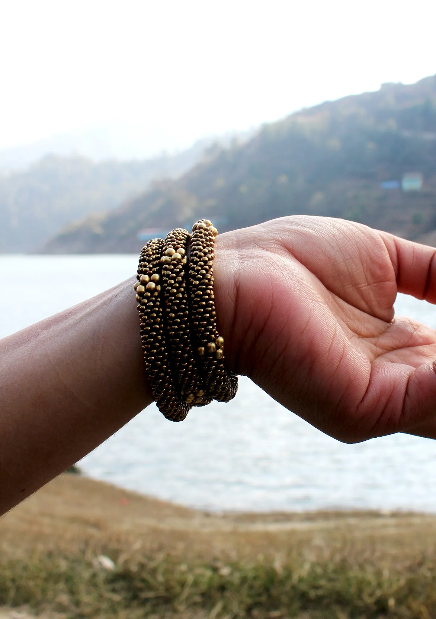 Golden Beads Nepalese Roll on Bracelet